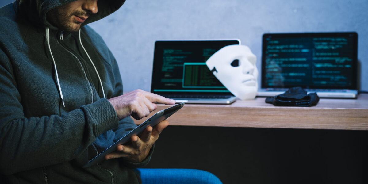 hacker-using-tablet